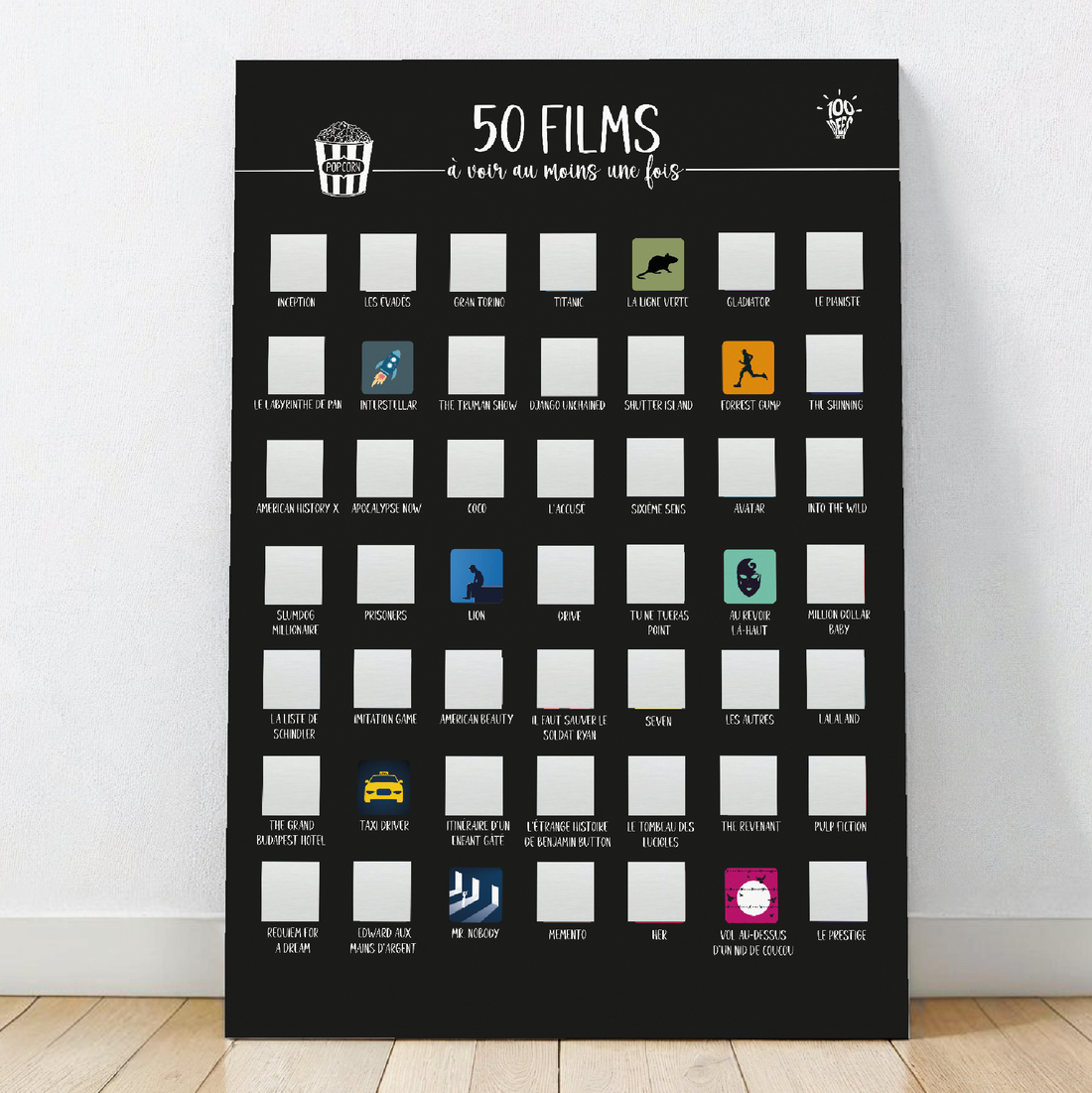 Affiche à gratter « 50 films à voir », un poster ludique pour découvrir et cocher vos films préférés.

